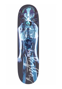 a skateboard with an image of a skeleton on it