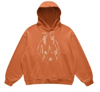 an orange hoodie with a drawing of a woman on it